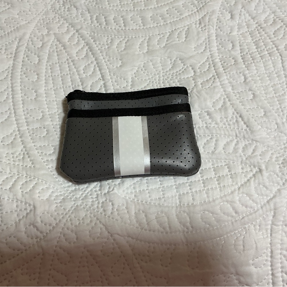 Gray and Black Perforated Pouch